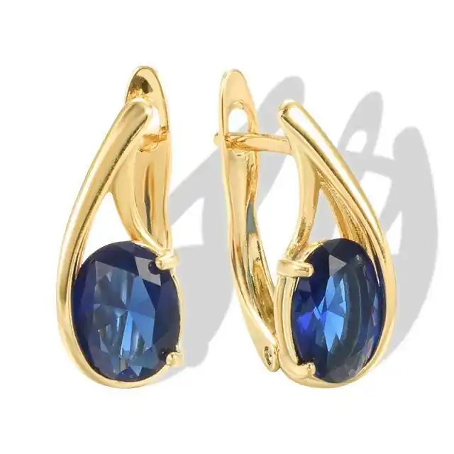 Gold Sculptural Drop Earrings with Blue Stone